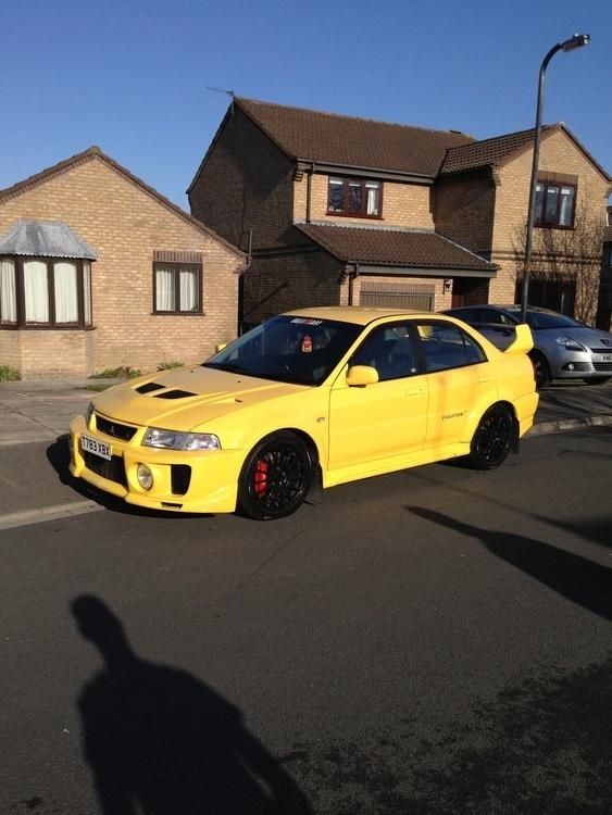 New on here but here is my dandelion yellow evo 5 | Mitsubishi Lancer ...